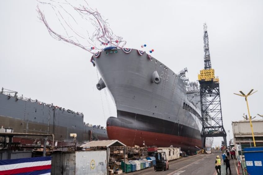 The USNS Harvey Milk leaves the General Dynamics NASSCO shipyard in San Diego, California,