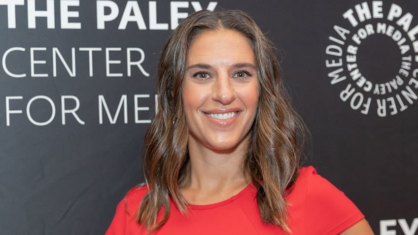 Carli Lloyd smiles