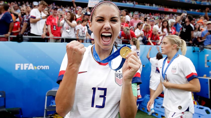 Alex Morgan celebrates