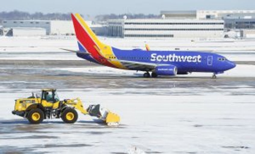 U.S. sues Southwest, fines Frontier over 'chronically' delayed flights