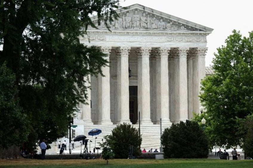 us supreme court weighs race and politics in gerrymandering case