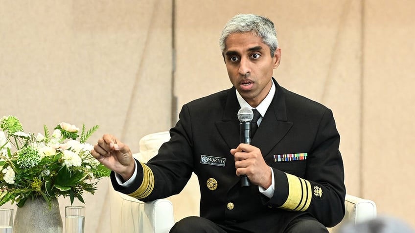 Vivek Murthy, US surgeon general speaking into mic