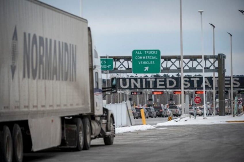 A truck prepares to enter the United States at a border crossing in Blackpool, Canada, a c