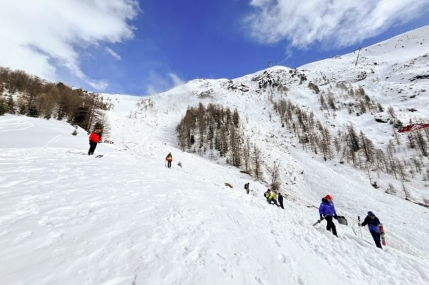 A police handout photo of the search and rescue operation at Zermatt on Monday