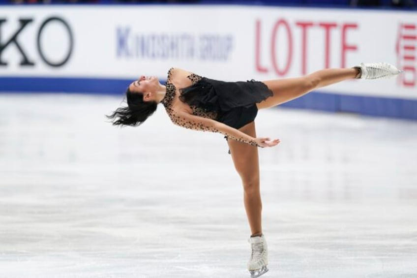 us teenager ziegler surges to first with a near flawless free skate to win the nhk trophy