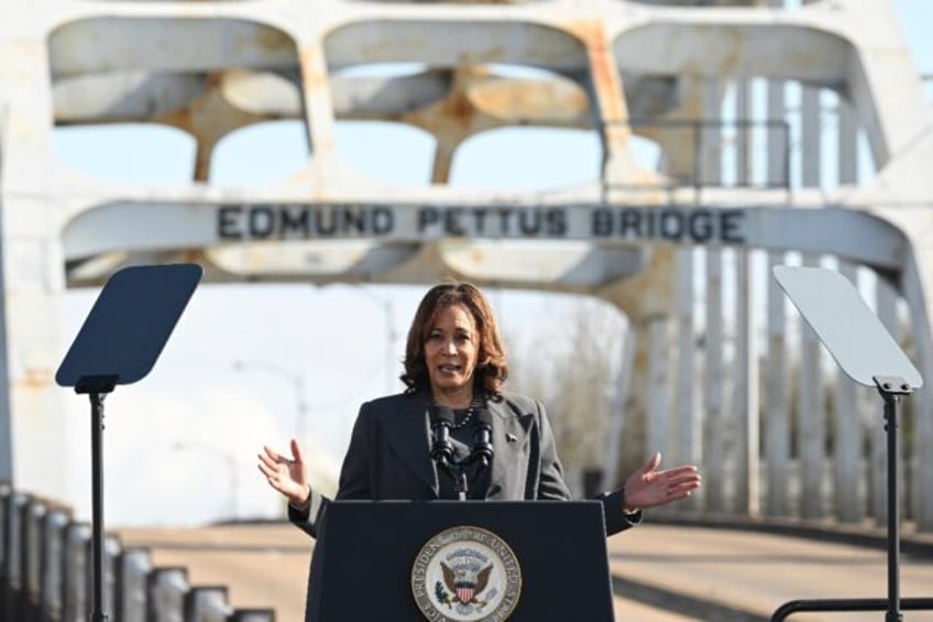 US Vice President Kamala Harris speaks at the Edmund Pettus Bridge during an event to comm