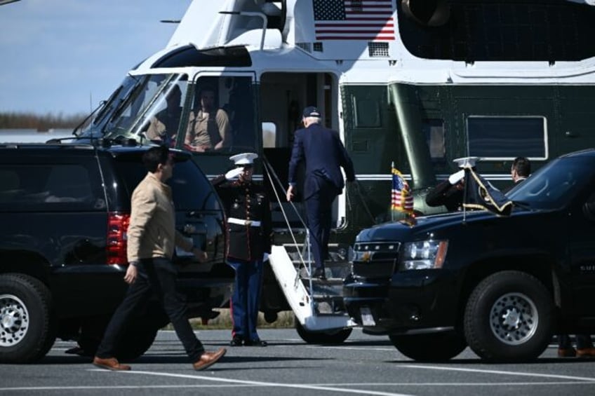 US President Joe Biden boards Marine One at Gordons Pond in Rehoboth Beach, Delaware, as h