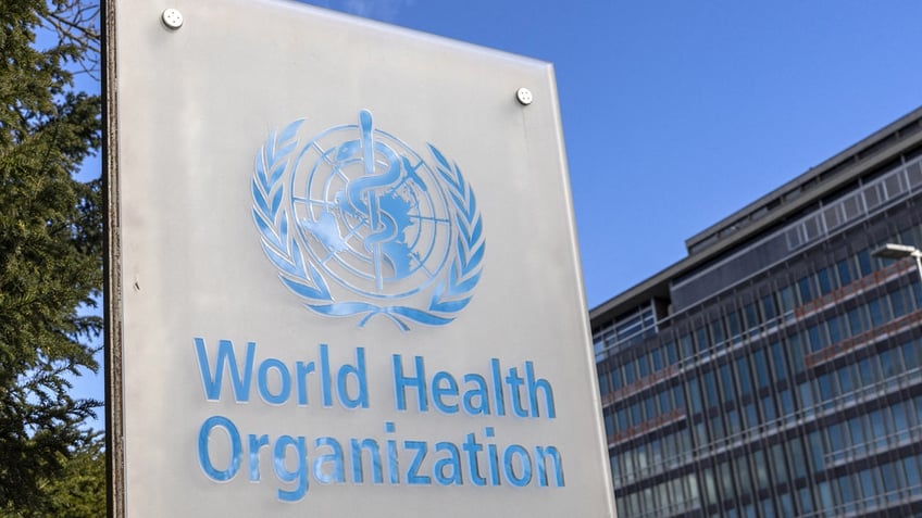 The World Health Organization logo is seen near its headquarters in Geneva, Switzerland.