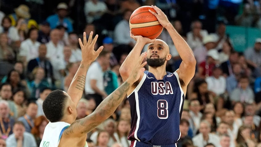 Derrick White shoots