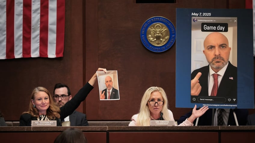 Rep. Melanie Stansbury (D-NM) (L) and Rep. Marjorie Taylor Greene (R-GA) (R) speak about an alleged screenshot from the Instagram of USA Fencing board director Damien Lehfeldt during the hearing on "Unfair Play: Keeping Men Out of Women’s Sports" held by the Department of Government Efficiency (DOGE) Subcommittee at the U.S. Capitol on May 7, 2025, in Washington, D.C. 
