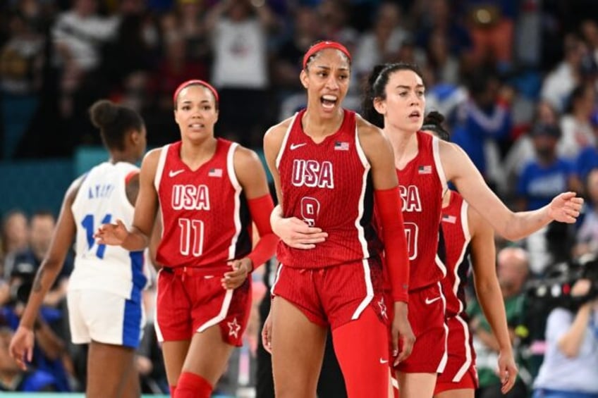 A'ja Wilson (C) came up big in the second half for the US as they claimed Olympic gold for