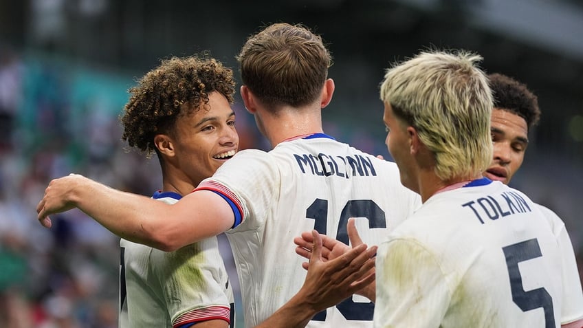 USA soccer celebrates