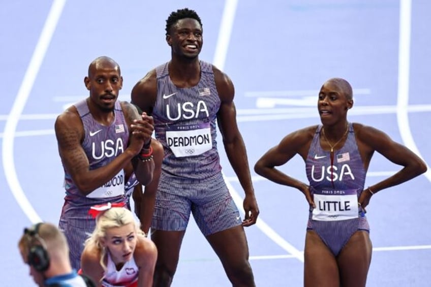 US athletes celebrate after their world record in the mixed 4x400m relay