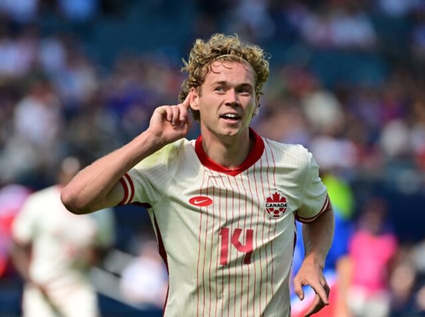 Canada forward Jacob Shaffelburg celebrates his team's opening goal in a 2-1 win over the