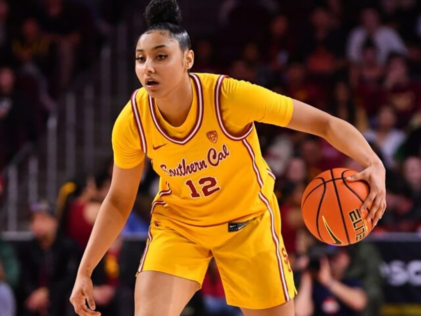 LOS ANGELES, CA - FEBRUARY 23: USC Trojans guard JuJu Watkins (12) dribbles up the court d