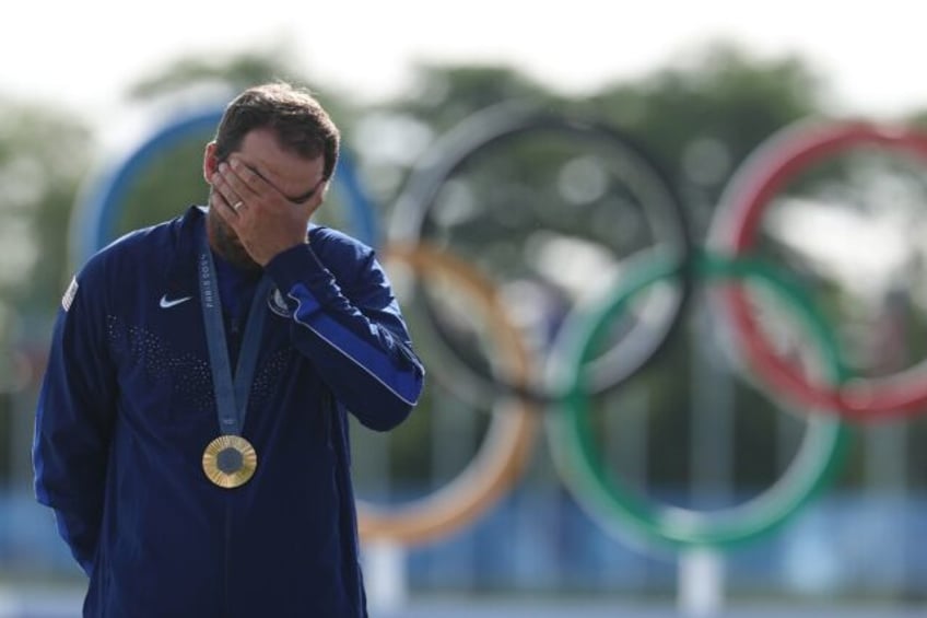 Scottie Scheffler was visibly emotional after receiving his gold medal