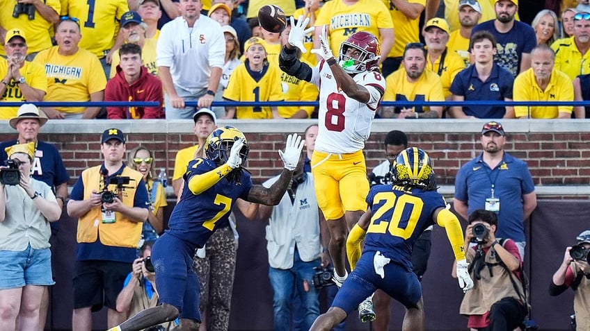 Ja'Kobi Lane jumps for catch