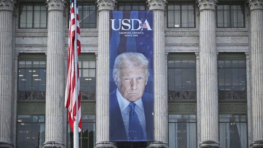 USDA building with Trump photo on side