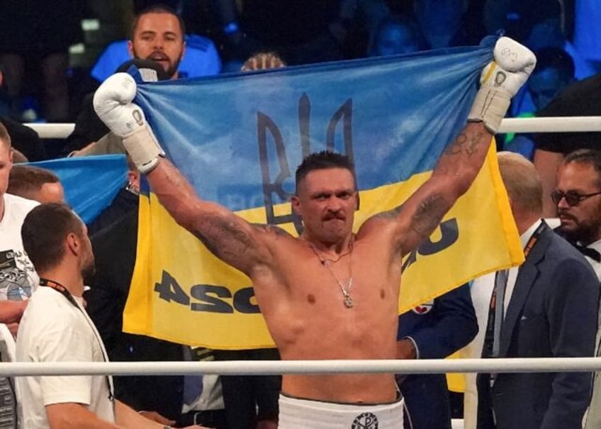 usyk stops dubois to retain world heavyweight titles