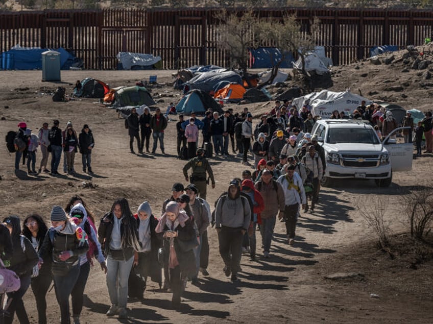 Migrants At The US-Mexico Border