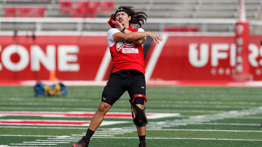 utah shuts down cam rising as star quarterback continues to rehab horrific knee injury