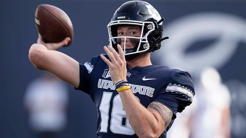 utah state quarterback reveals plans for navy seal training after tremendous performance in win