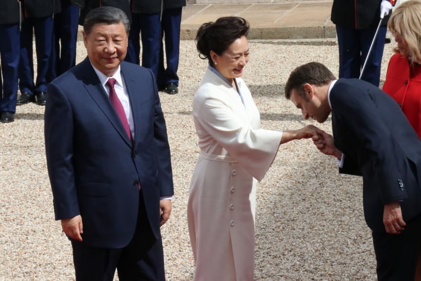 uyghurs tibetans condemn france for hosting genocidal ogre xi jinping