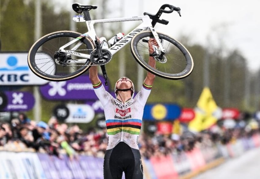 Mathieu van der Poel celebrateshis third Tour of Flanders victory