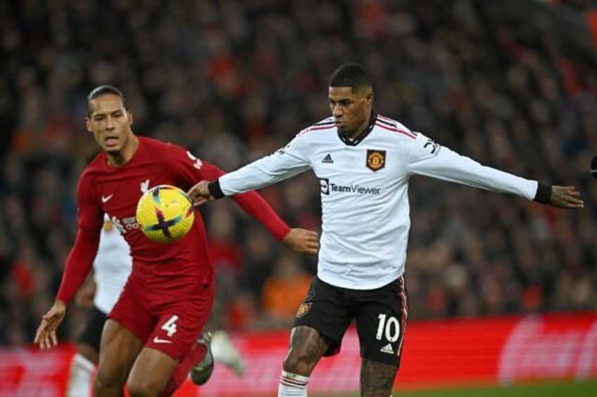 Marcus Rashford (right) denied accusations Manchester United gave up during a 7-0 defeat t