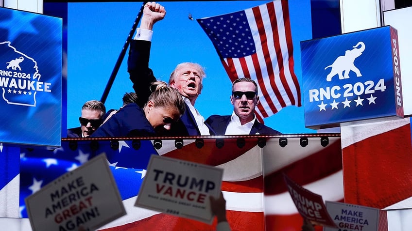 Pictures of the assassination attempt of Republican presidential candidate former President Donald Trump are displayed during the Republican National Convention