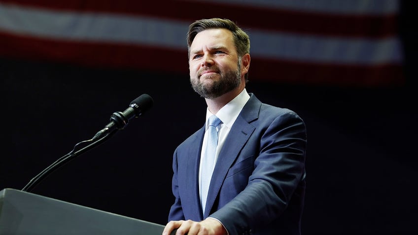 JD Vance closeup profile shot at microphone