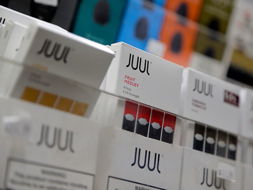 Juul products are displayed at a smoke shop in New York, on Dec. 20, 2018. Embattled vapin