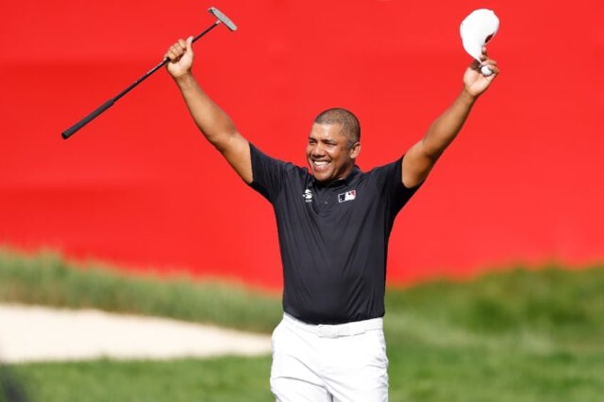 Venezuela's Jhonattan Vegas celebrates after snapping a seven-year PGA Tour win drought wi