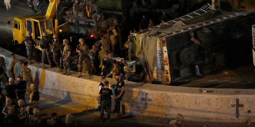 vehicle of lebanons defense minister struck by gunshots near beirut no injuries reported