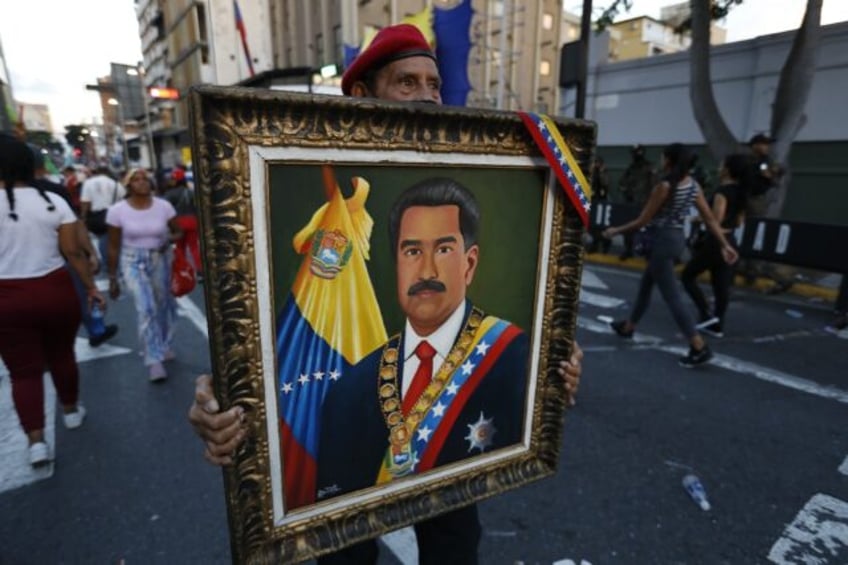 Venezuela's CNE electoral council proclaimed Maduro the winner with 52 percent of votes ca