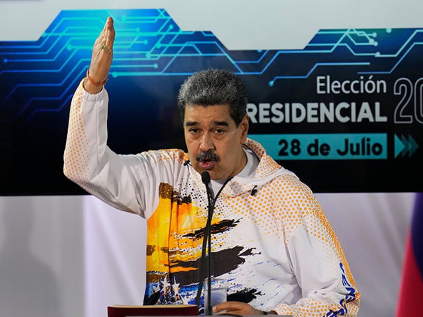 Venezuelan President Nicolas Maduro speaks at the National Election Commission (CNE) where