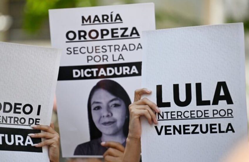 Venezuelan protesters urged Brazil's President Luiz Inacio Lula da Silva to intercede on b