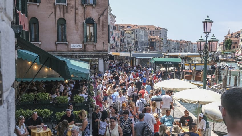 venice could be stripped of special status as it faces tourism crisis