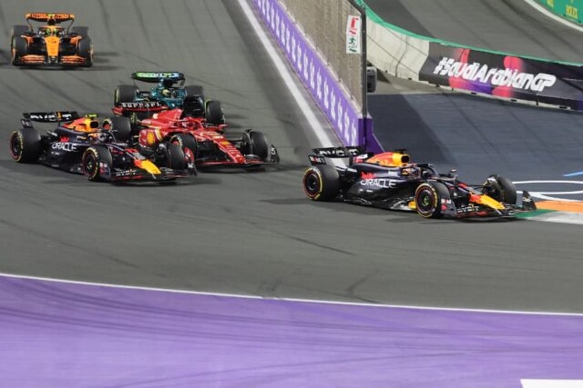 Max Verstappen leads his Red Bull teammate Sergio Perez to victory in Jeddah