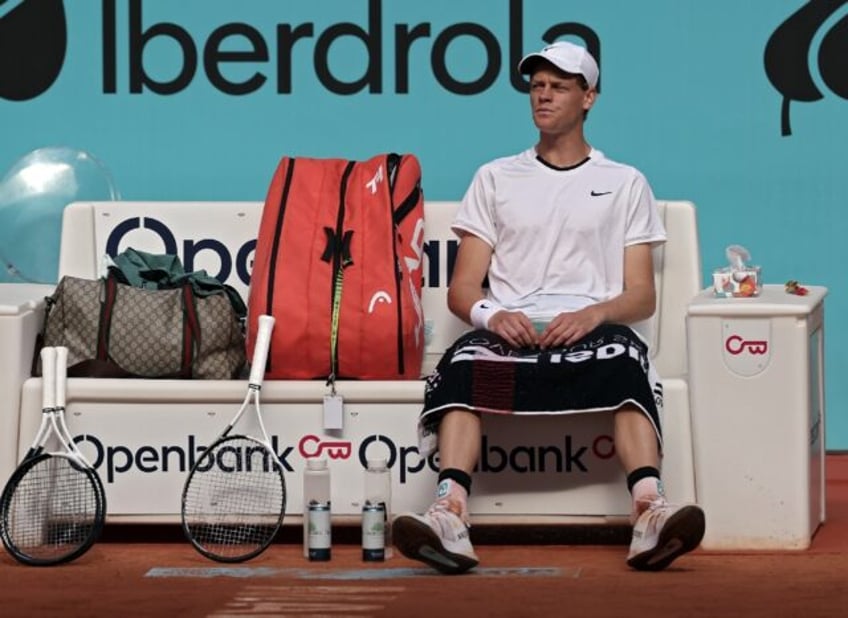 Injured: Jannik Sinner in a changeover in his last-16t win over Karen Khachanov