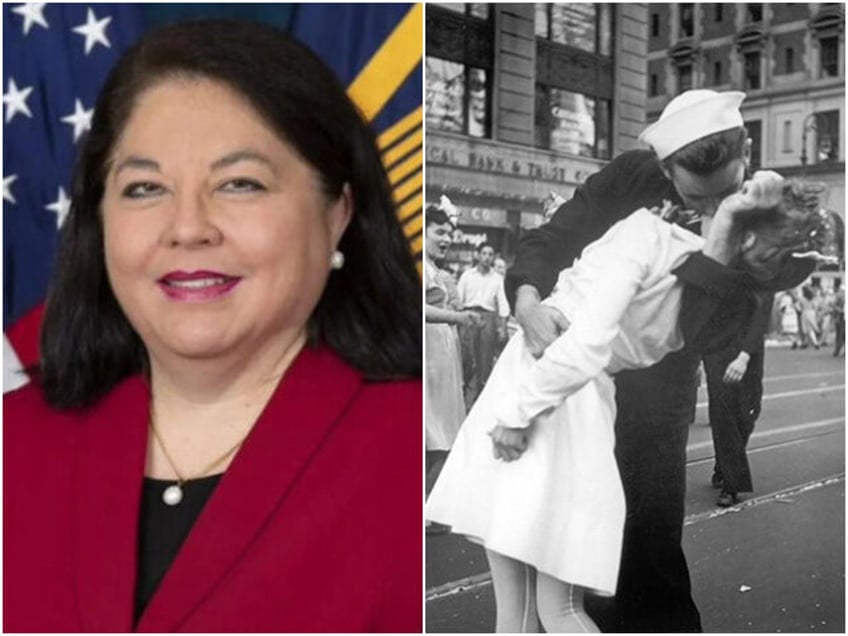 In this photo provided by the U.S. Navy, a sailor and a nurse kiss passionately in Manhatt