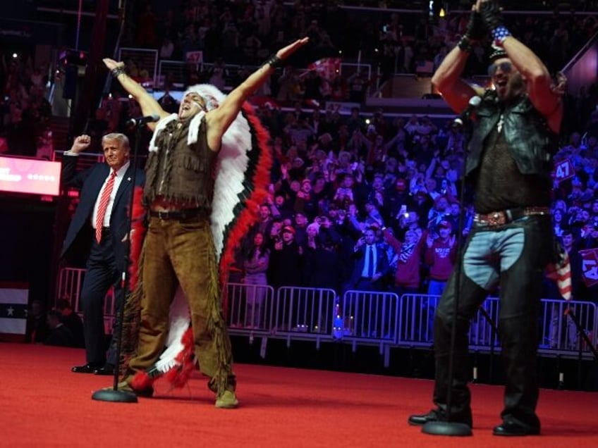 President-elect Donald Trump dances with The Village People at a rally ahead of the 60th P