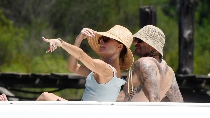Victoria Beckham and David Beckham enjoy the sun on a yacht
