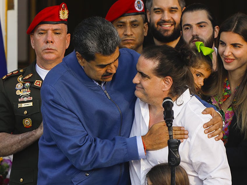 The president of the Bolivarian Republic of Venezuela, Nicolas Maduro (L), receives businessman Alex Saab (R), at the Miraflores Palace, in Caracas, Venezuela on December 20, 2023. Colombian businessman and diplomat Alex Saab was released by Washington in exchange for Caracas agreeing to release 36 people, including 12 American citizens. …