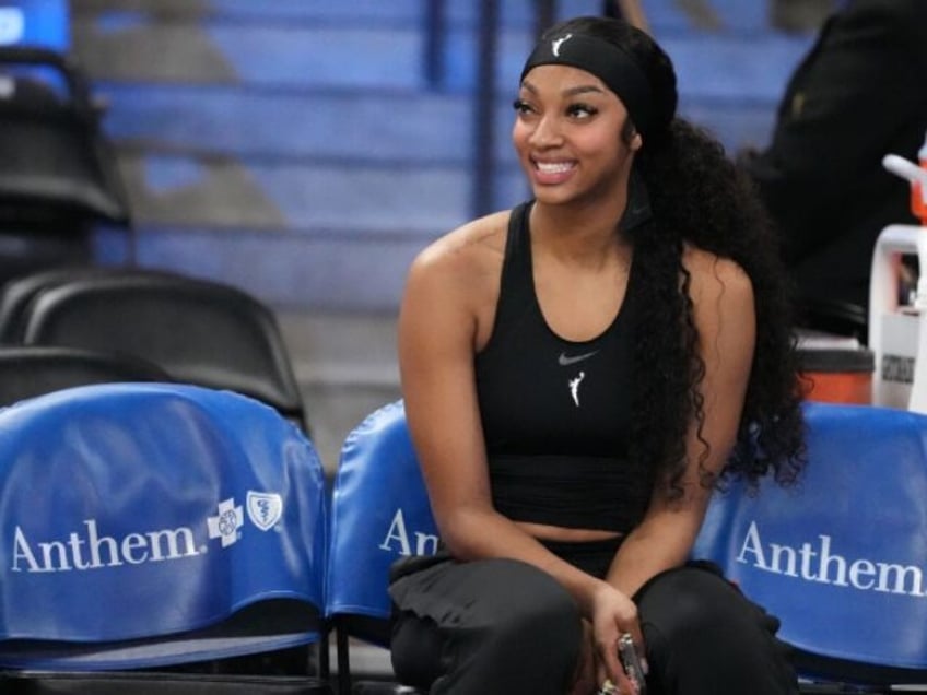 ATLANTA, GA - JULY 2: Angel Reese #5 of the Chicago Sky smiles before the game against the