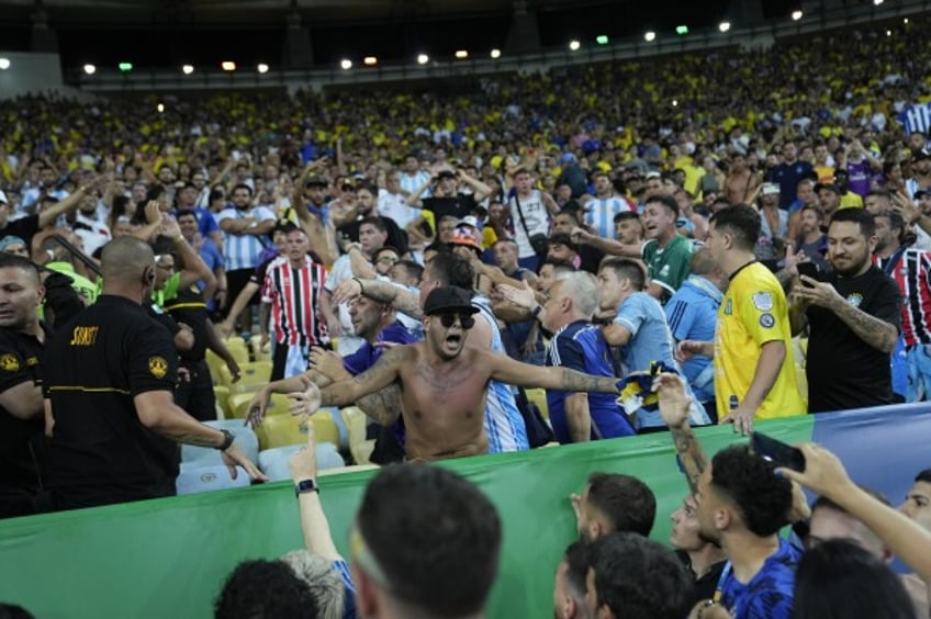 video brawling fans in stands delay start of argentina brazil world cup qualifying match for 27 minutes