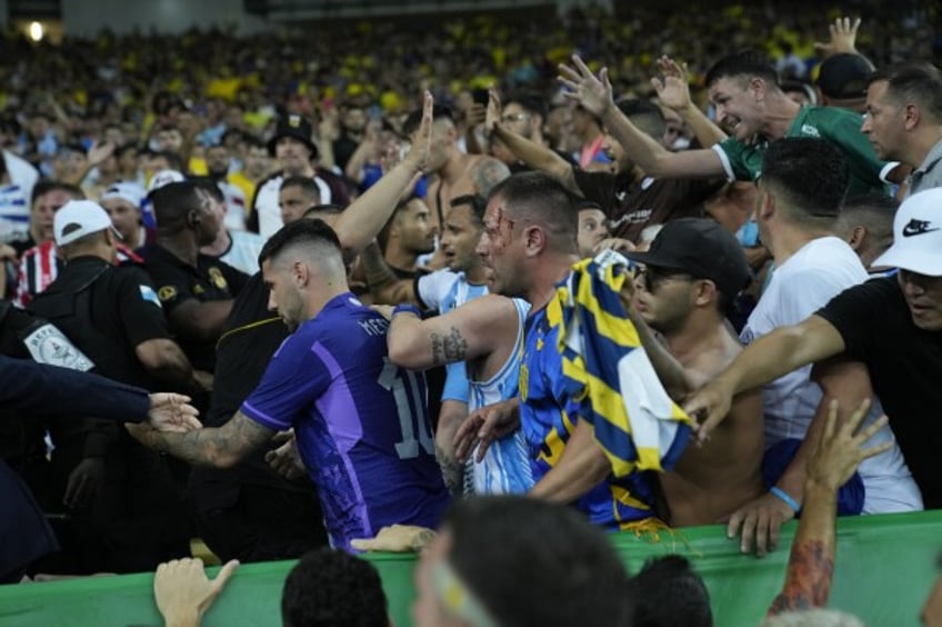 video brawling fans in stands delay start of argentina brazil world cup qualifying match for 27 minutes