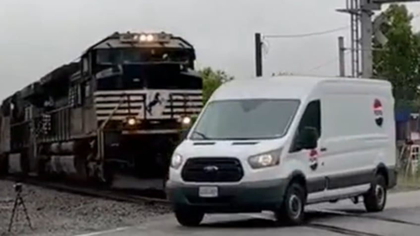 Virginia train almost strikes van