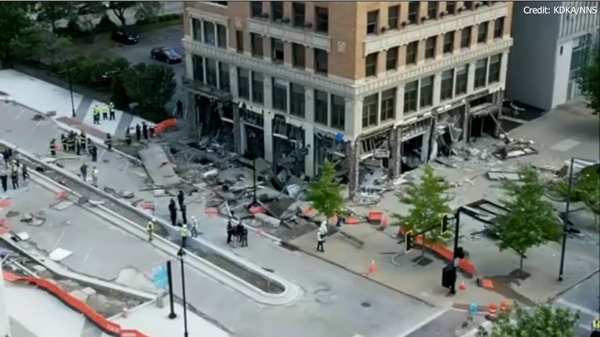 aerial view of destroyed building post explosion