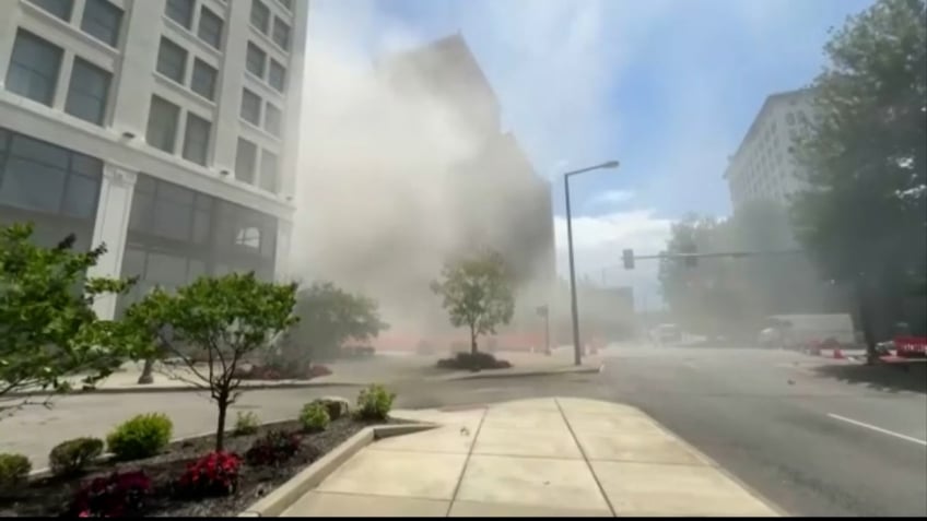 smoke covers buildings and street following explosion